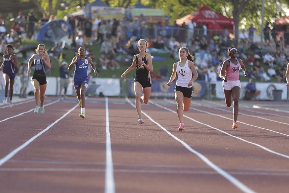 Mountain View High’s Hannah Rutherford, center, races in the girls 400-meter dash at the state track and field championships last month in Clovis. The sophomore sprinter set a personal record in the preliminaries and placed fourth in the finals, earning a medal.