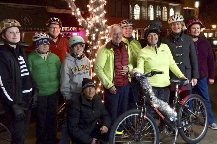Courtesy of Gary HeddenGreenTown’s annual Winter Solstice Night Bike Ride attracts cyclists of all ages and experience