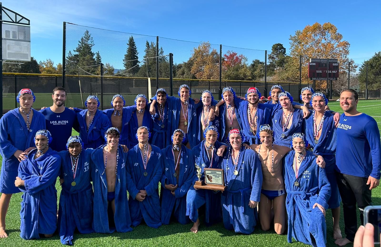 The Los Altos boys water polo team celebrate winning the CCS Division I title over Serra.