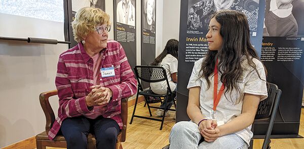Teen docent Parisa Braun, right, interviews Janet Harding at the “What’s Old Is New Again” event that drew a roomful of teens and seniors, above right, to the Los Altos History Museum April 9.