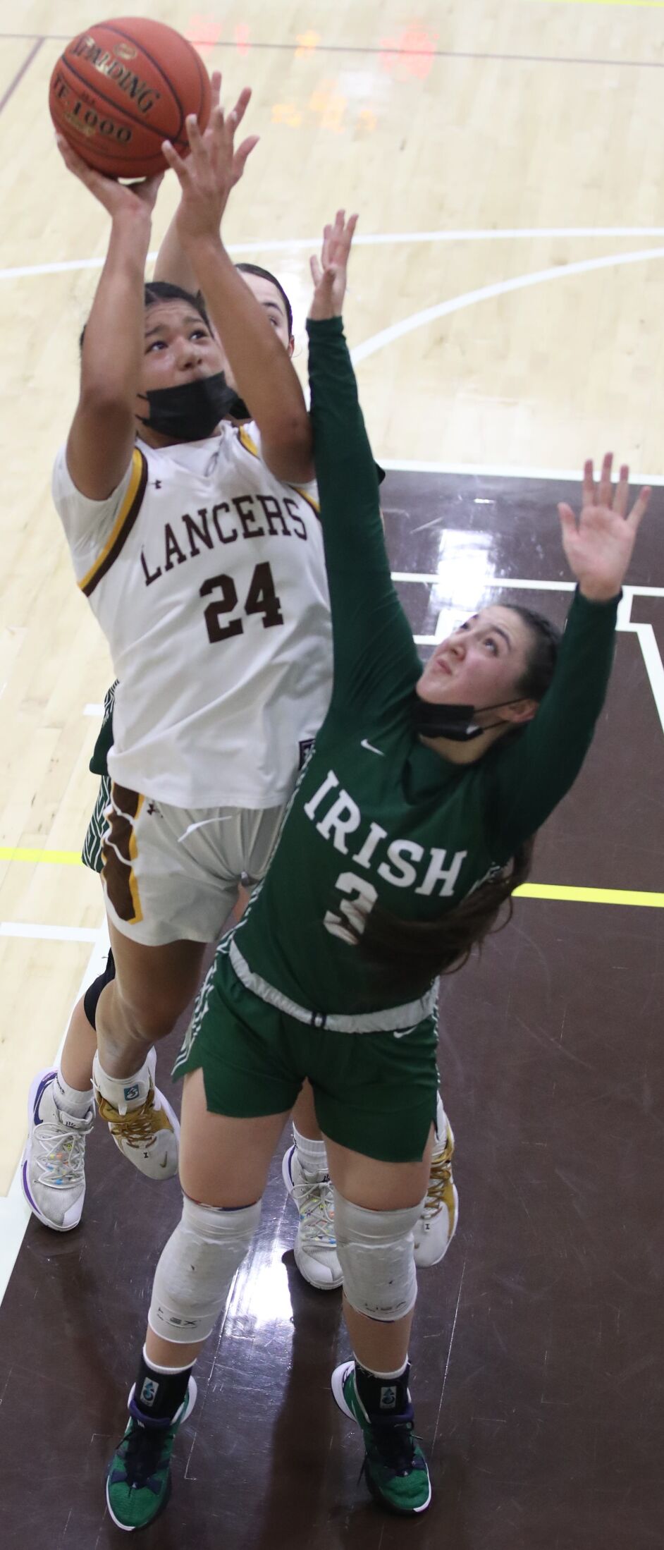 St. Francis High's Sydney Stewart, shooting over a Sacred Heart Cathedral player earlier this month, scored 12 points and grabbed 10 rebounds in Thursday's home loss to St. Ignatius.