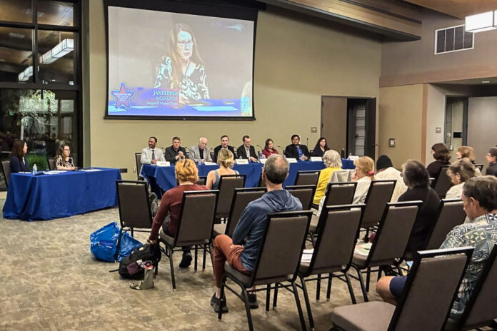 Mountain View's city council candidates at the Oct. 8 forum, with event moderator Jan Pepper. From left, Samuel Ali, Alexander Amoroso, Robert Cox, Paul Donahue, James Kuszmaul, Silja Paymer, Erik Poicon and IdaRose Sylvester.