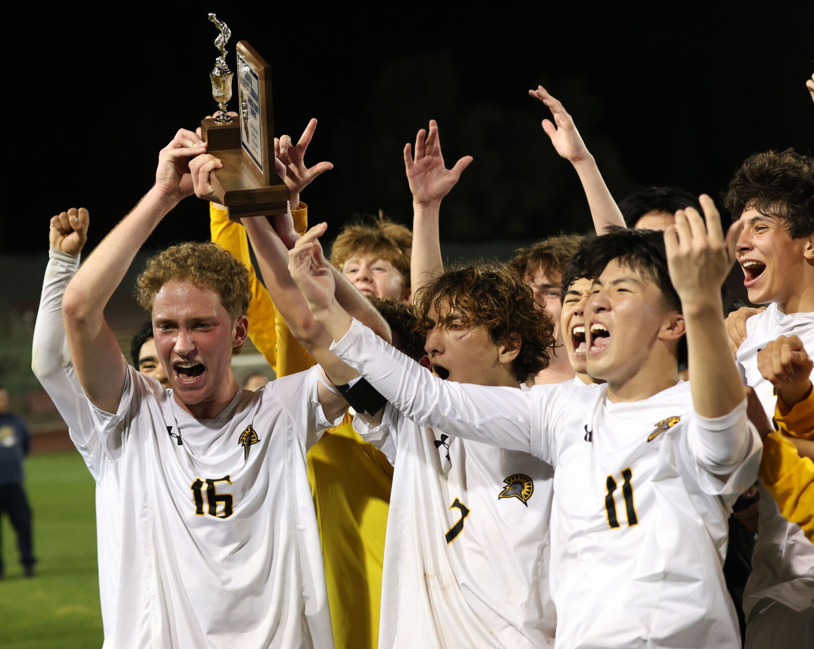 The Mountain View boys soccer team lifting the CCS Division I title after a 2-1 win in extra time over Everett Alvarez.