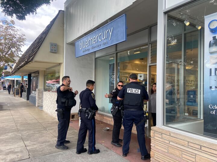 Los Altos Police Department officers speaking to people at the Bluemercury store in downtown Los Altos.