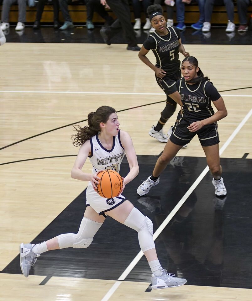 Mitty’s Morgan Cheli drives to the basket against Salesian in the NorCal Open final. The Los Altos resident scored 15 points in that game and 24 in the state title game.