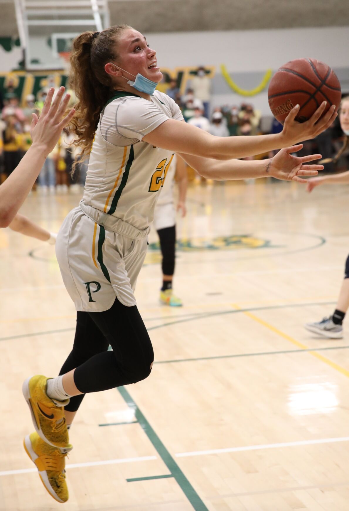 Pinewood School's Elle Ladine lays up a shot in Wednesday's NorCal Open Division quarterfinal game. The senior scored a game-high 31 points in the Panthers' loss to Oak Ridge.