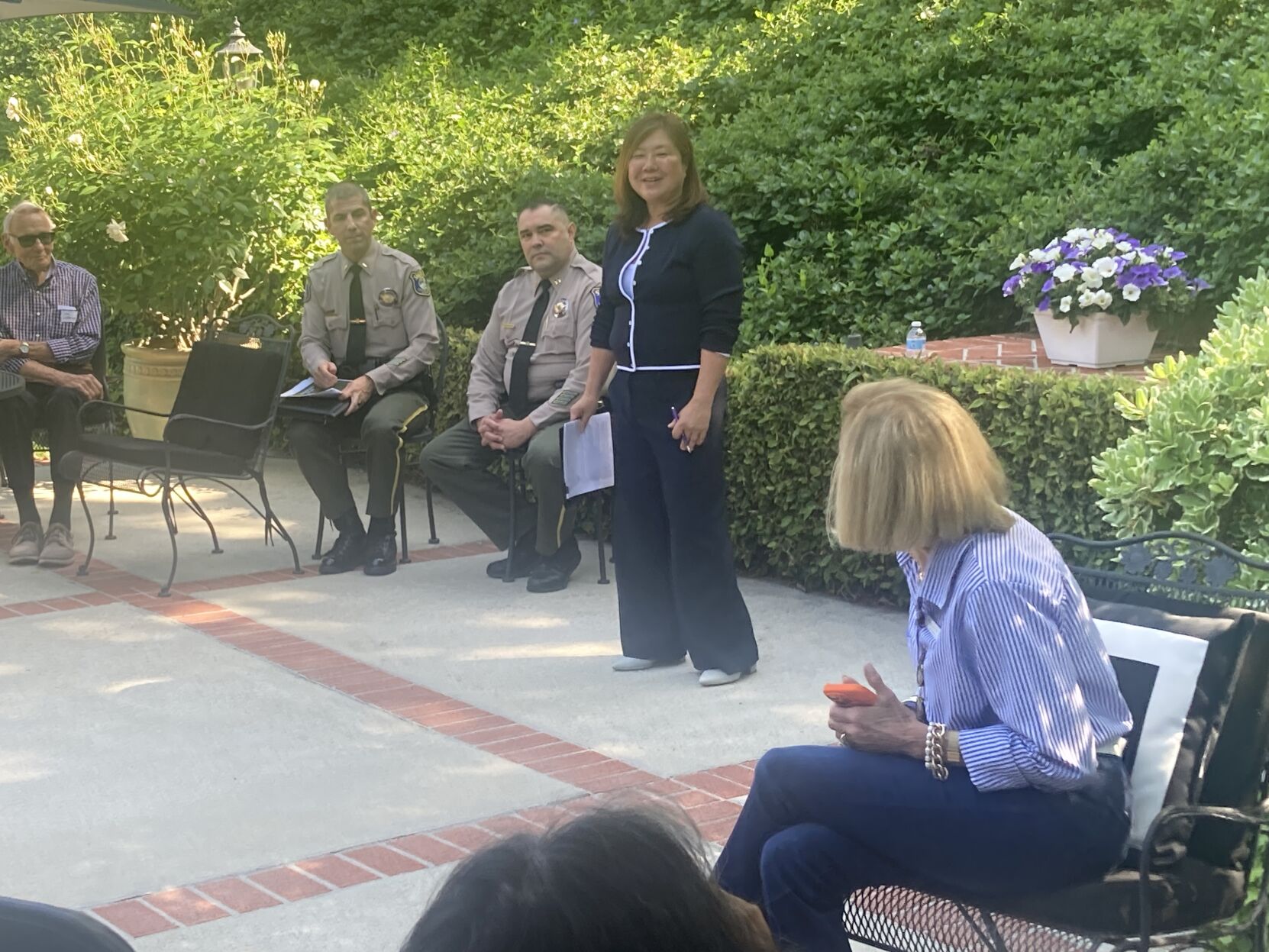 Santa Clara County Supervisor Margret Abe-Koga, standing, leads a crime prevention presentation in Los Altos Hills.