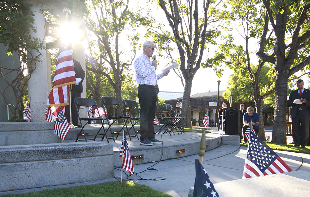 Rotarian Ron Labetich delivers remarks during a 2018 dedication ceremony for Veterans Community Plaza. Labetich is set to speak at Thursday’s Veterans Day event.