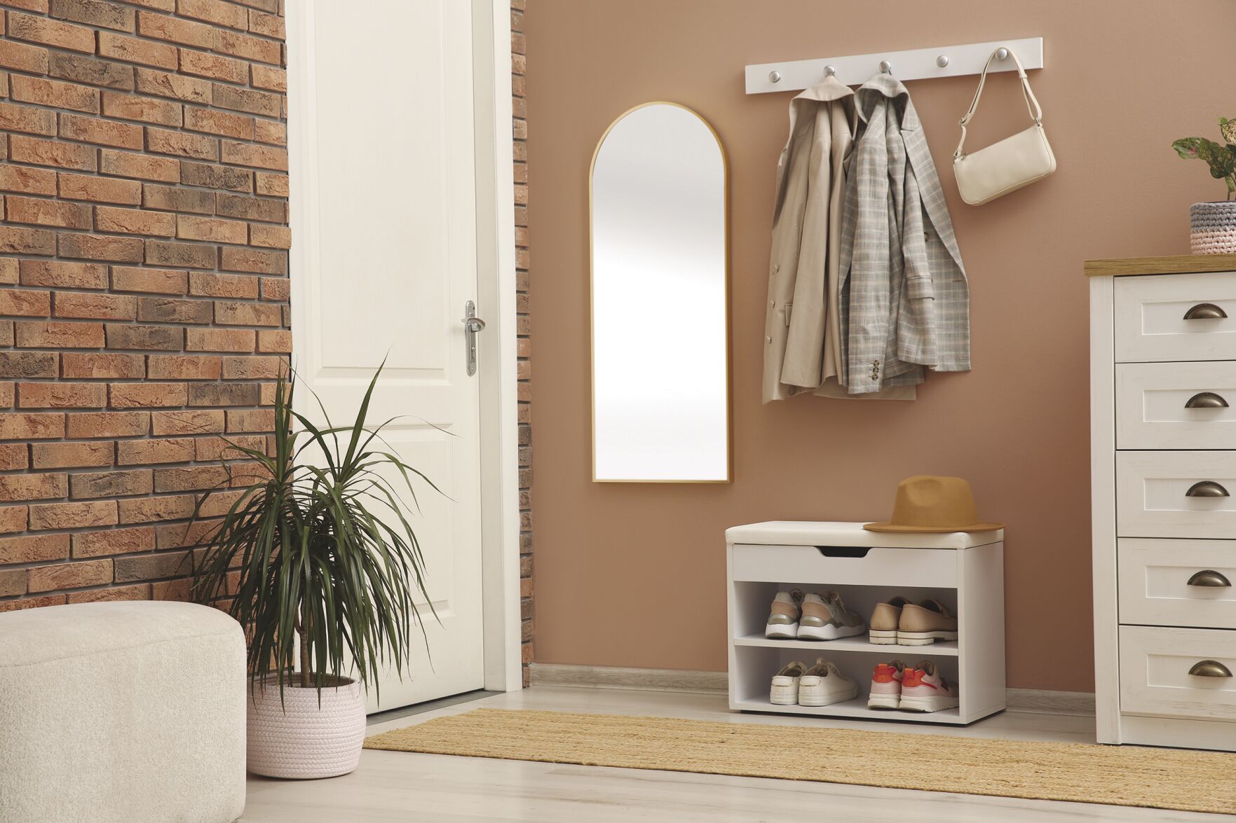 A rack with different shoes near the door serves as the command center.