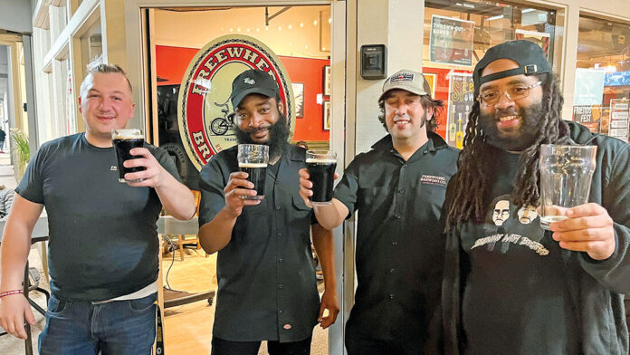 During SF Beer Week last month, Freewheel Brewing Co. held a release party for Maple House, a coffee maple porter brewed as a collaboration with Brewing With Brothas. Pictured, from left, are Freewheel general manager Brian Ressler, Brewing With Brothas co-founder Denzel Jackson, Freewheel head brewer Alex Feinberg and Brewing With Brothas co-founder RiSean “Bookie” Tinsley.