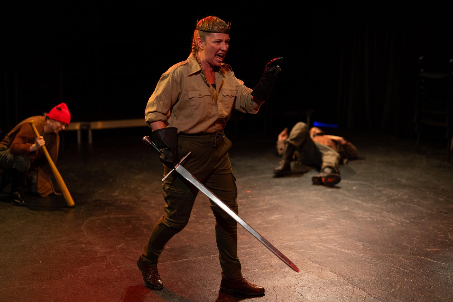Pictured from left, Annamarie MacLeod, Jennifer Le Blanc and William J. Brown III. Le Blanc, who portrays Henry V, displays her full power in her role as the king as she prepares to conquer France from King Charles VI.