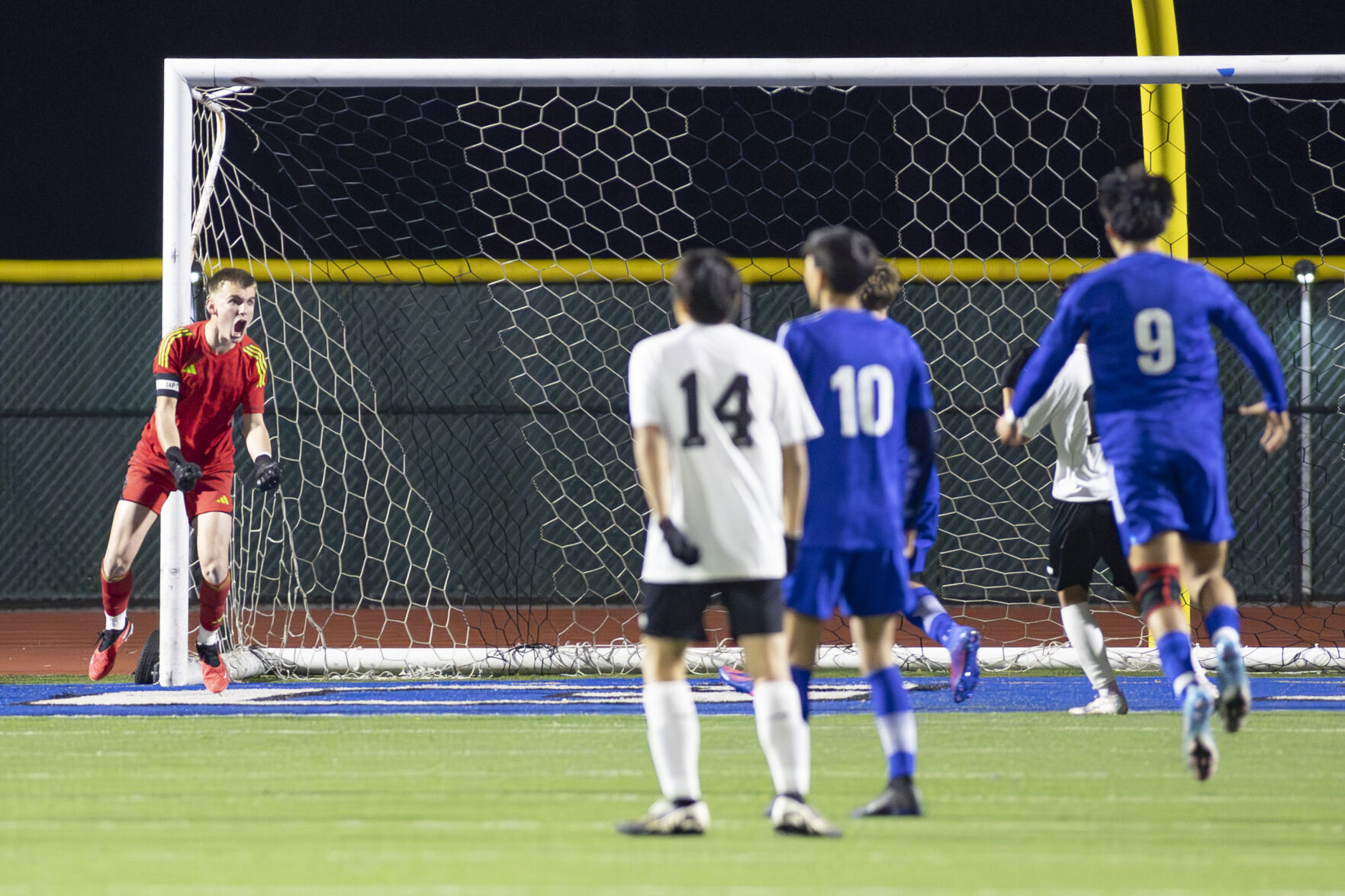 Los Altos goalkeeper Carson Gamble celebrates saving a penalty in the last minutes of the second half of the Gunn game to keep the score at 1-1.