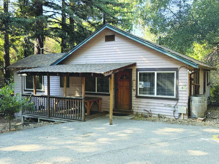The caretaker cottage at Redwood Grove is pictured above.