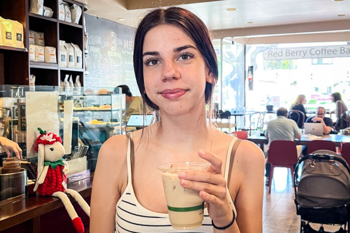 Kate Rose at her favorite spot for a latte, Red Berry Coffee Bar.