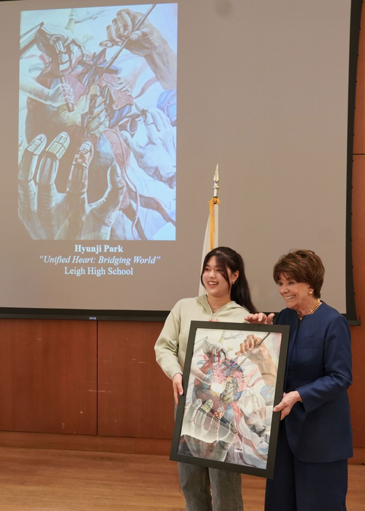 U.S. Rep. Anna Eshoo standing next to the 2024 Congressional Art Competition winner Hyunji Park from Leigh High School. Park’s work “Unified Heart: Bridging World” won first place.